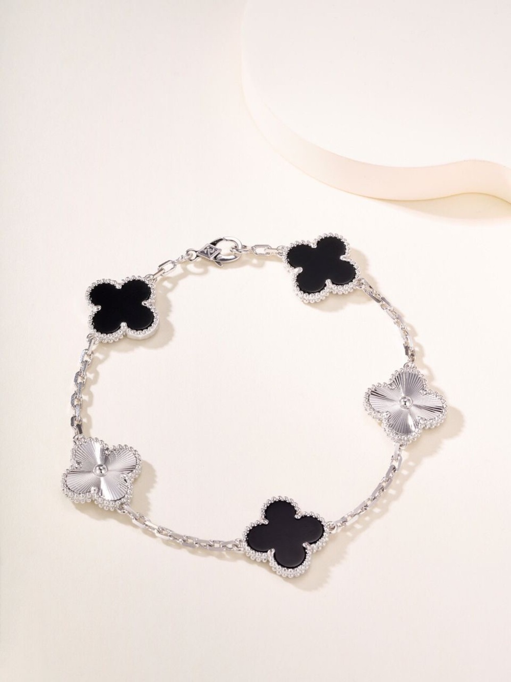 Van Cleef & Arpels Silver Bracelet with Black Clover Motifs